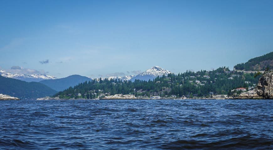 Snow capped mountains can be seen on the way to Passage Island 