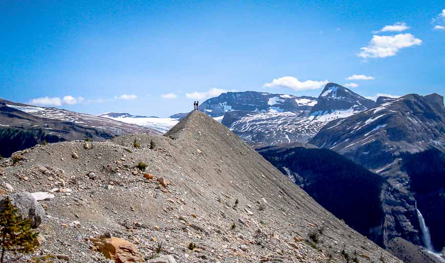 Two guys admiring Takakkaw Falls