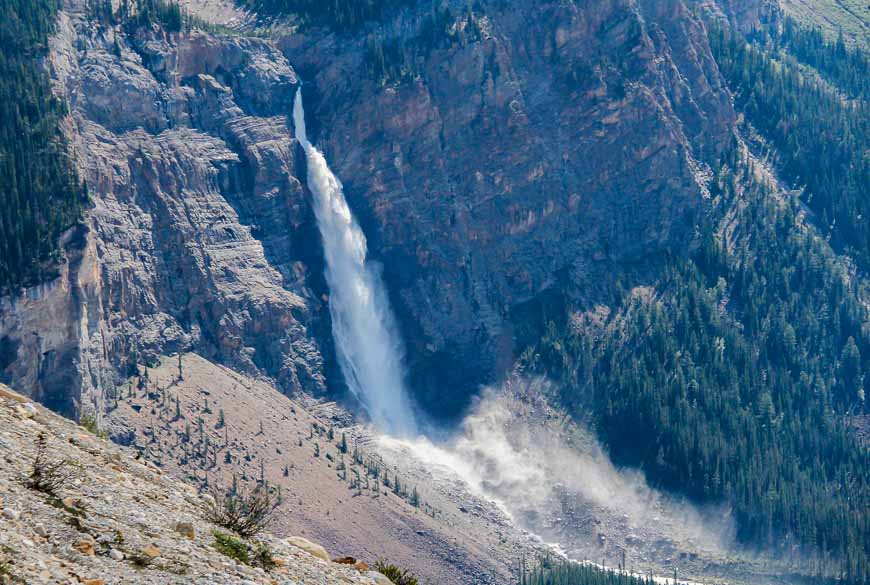 Two guys admiring Takakkaw Falls