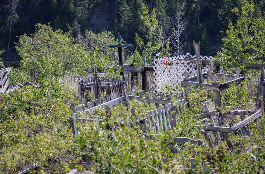 Pay your respects at the native cemetery on Highway 20