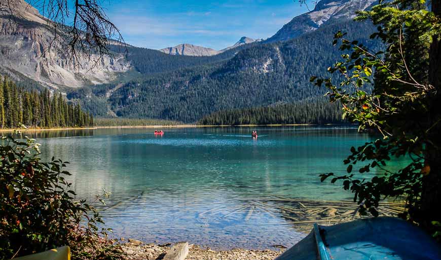 On the Emerald Lake hike enjoy the sight bright red canoes on the lake