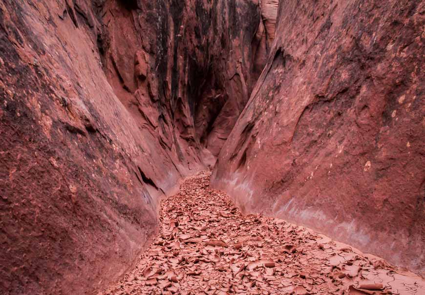Coming out of the slot canyon walking on dried mud