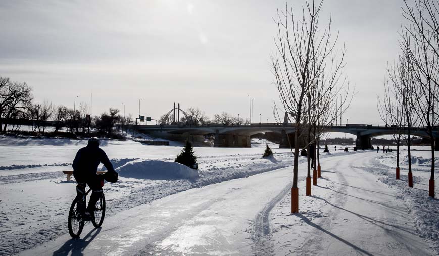 A fellow biking the frozen Red River