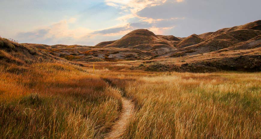 Beautiful prairie skies and colours in Grasslands National Park in the fall with hiking here one of the top adventures in Saskatchewan