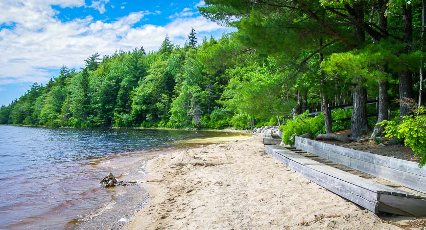 Kayaking Kejimkujik past some beautiful sandy beaches