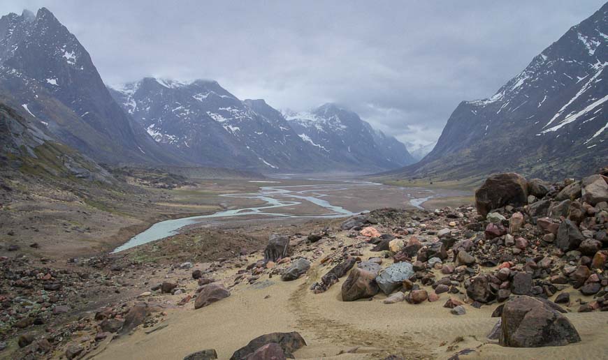 Crossing the Arctic Circle on Baffin Island offers a view up the Weasel River towards Mount Overlord