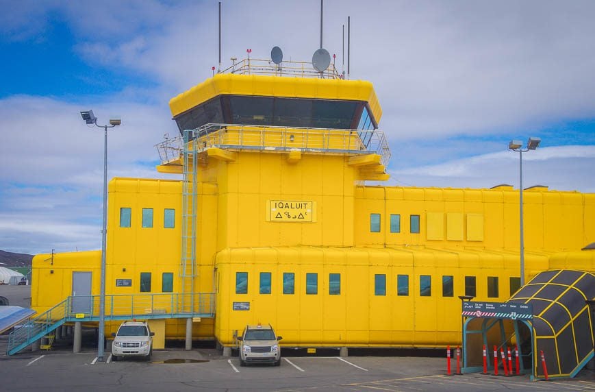 What a welcoming colour for an airport - notice the fact the building is constructed above ground due to permafrost