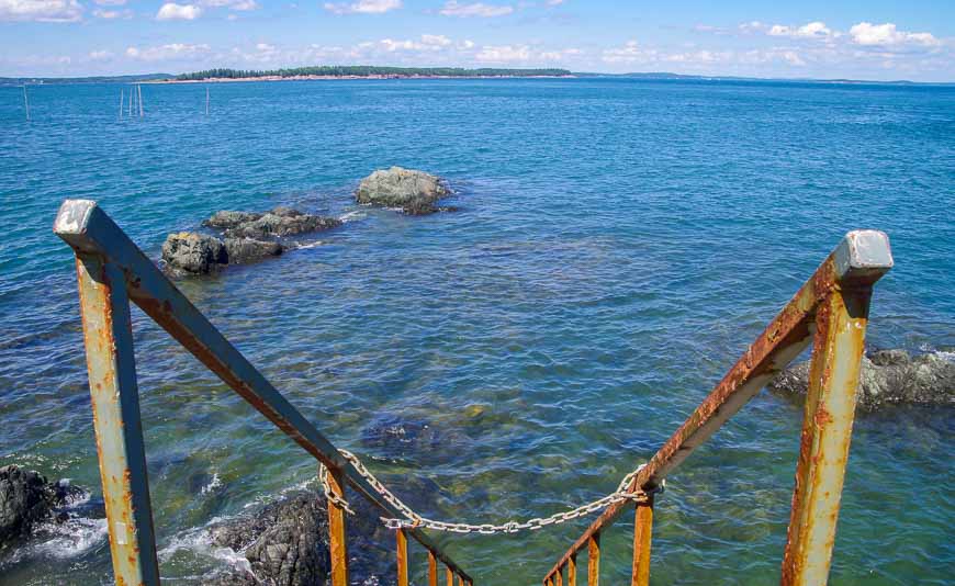 At low tide take a set of stairs down and walk to the Head Harbour Lightstation