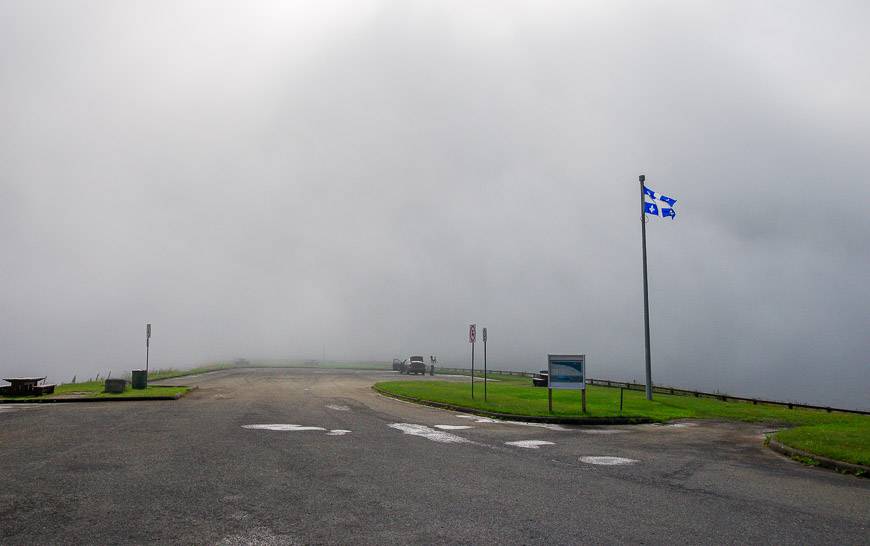 Fog adds a moodiness to a deserted parking lot