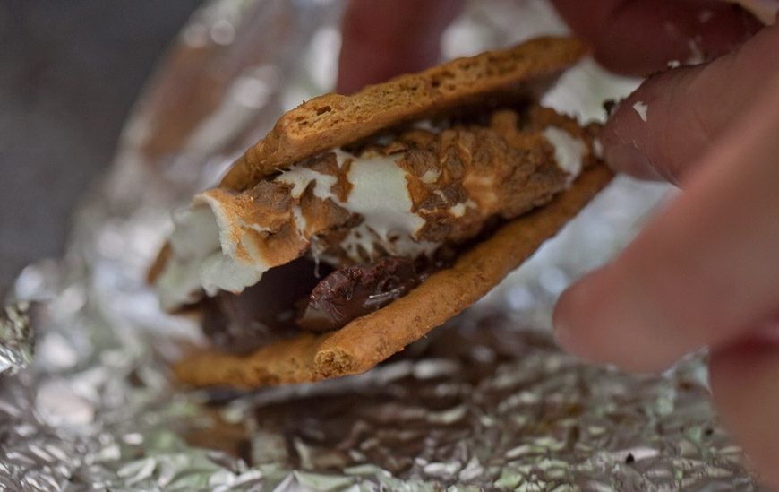 Smores - two graham wafers, a roasted marshmallow & melted chocolate