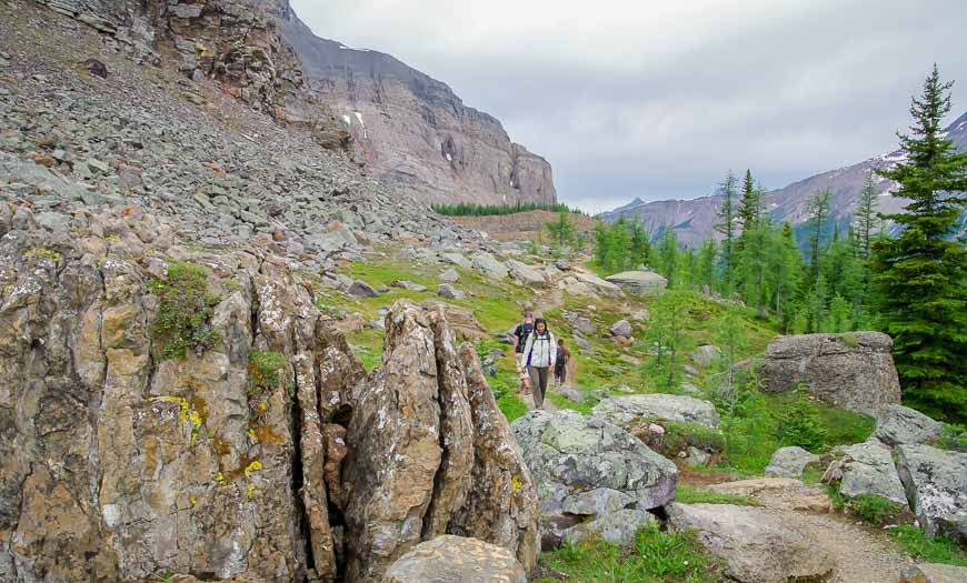 Following the trail through lichen covered boulders on the Lake McArthur hike