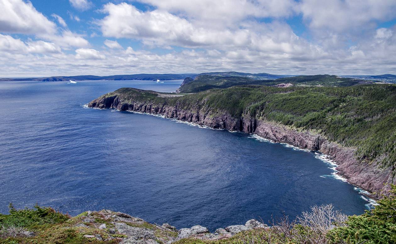 Rugged cliffs and icebergs keep the hiking interesting