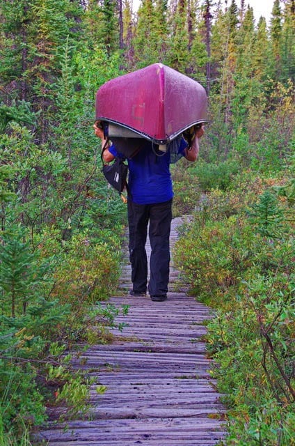"Portaging on a boardwalk of sorts on the second portage"