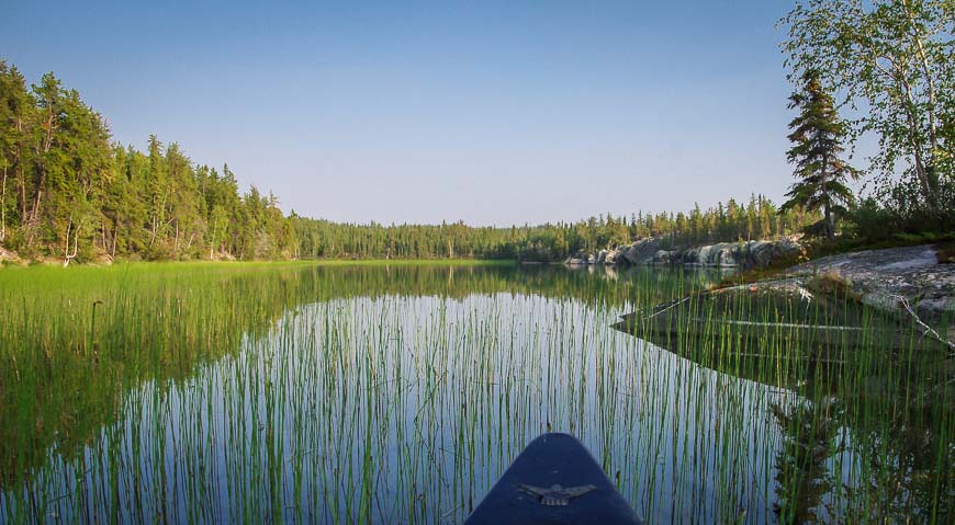 Paddling through the greenery in a shallow section as we explored the islands in Hidden Lake