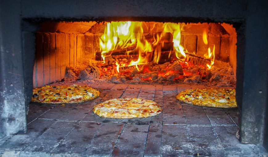 Super hot pizza oven cooks them in about 5 minutes