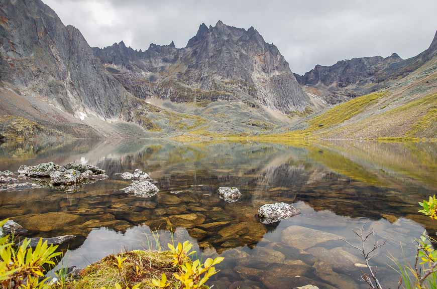 Fantastic setting at Grizzly Lake even under cloudy skies - one of the best backpacking trips to do in Canada in summer