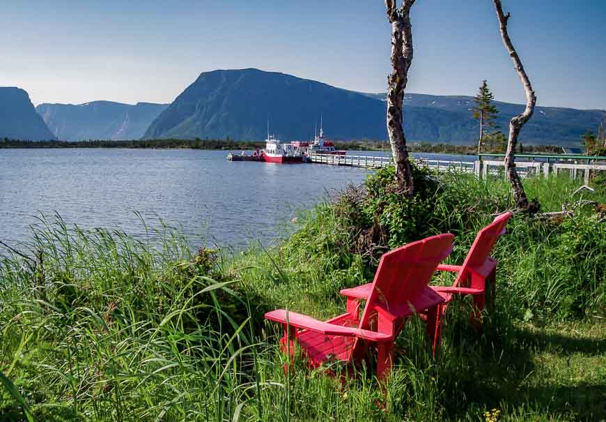 Parks Canada red chairs looking out over Western Brook Pond