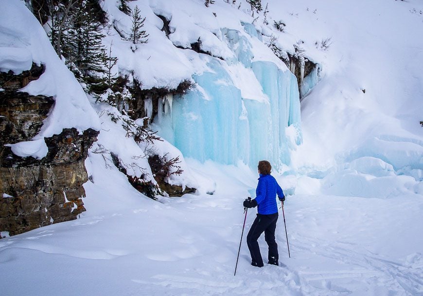 In awe of the beauty of the frozen waterfall