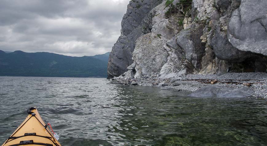 Kayaking past wildly eroded cliffs in the Norris Point area