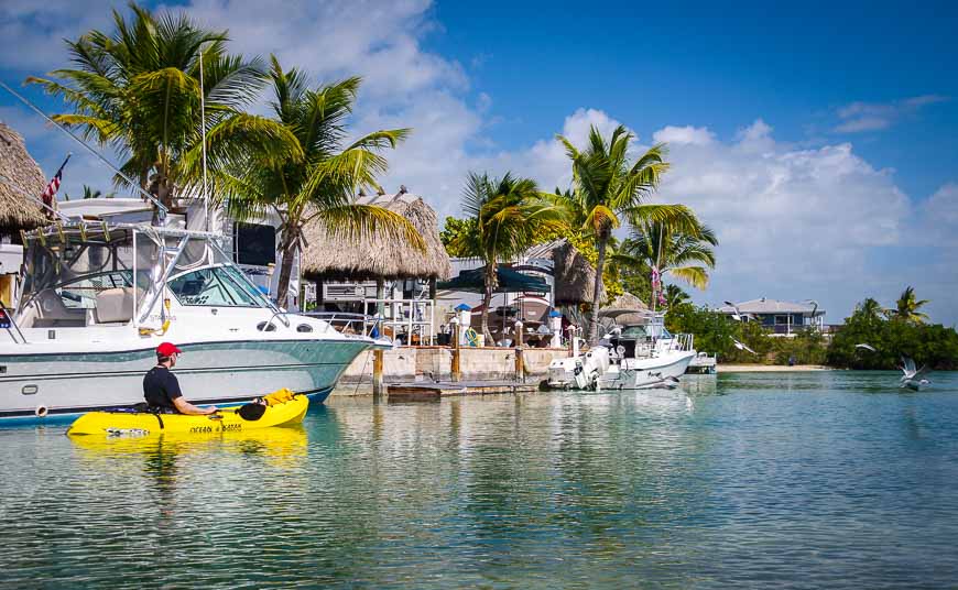 Start the Florida Keys kayaking tour by paddling past homes/boats on Geiger Key