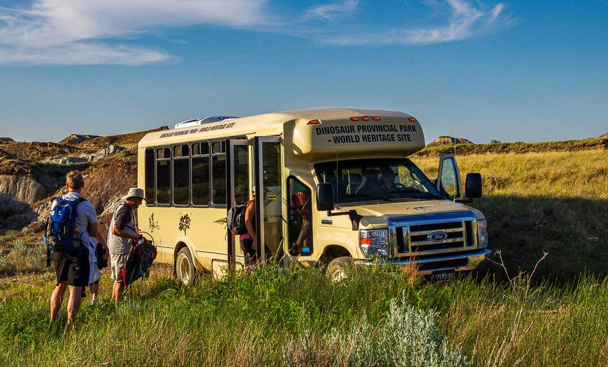 An air conditioned bus takes you into the backcountry in Dinosaur Provincial Park