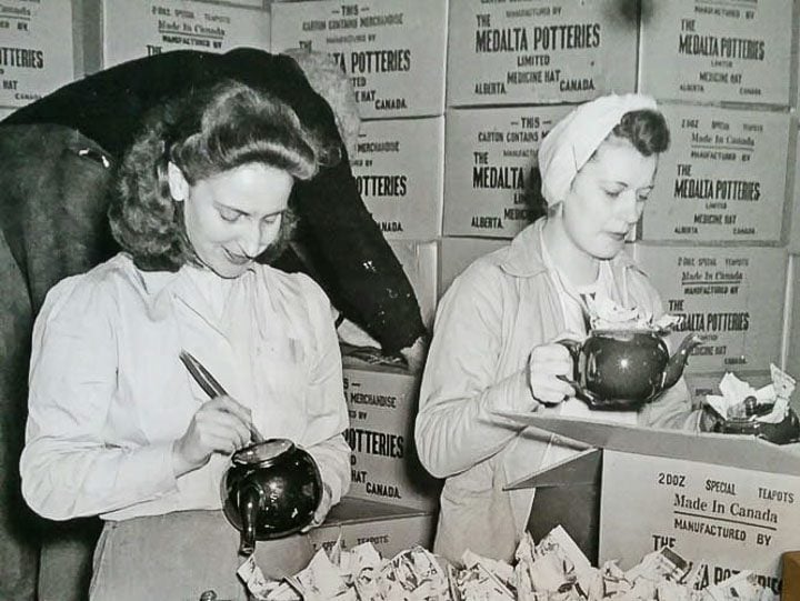 Woman in curlers at work