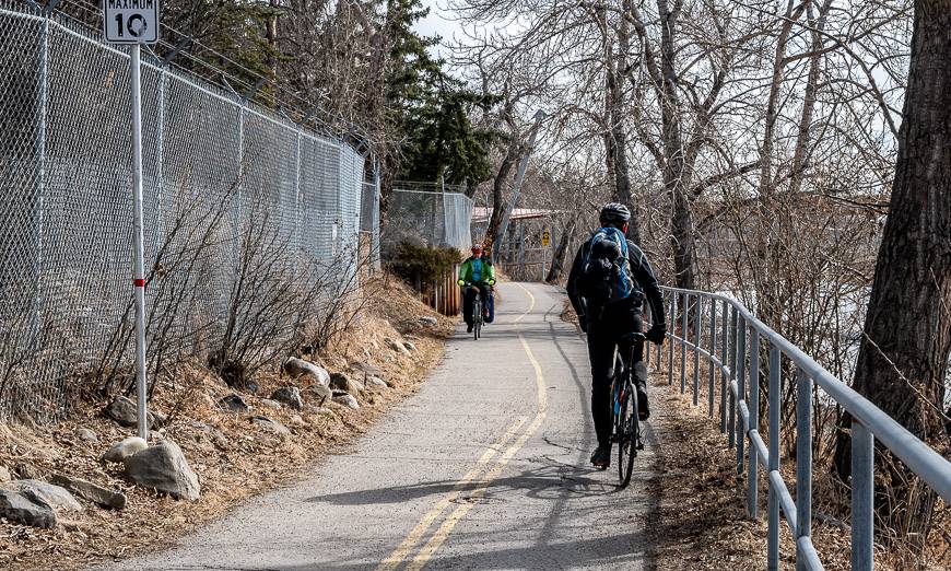 Cycling on a trail behind the zoo towards Deerfoot Trail