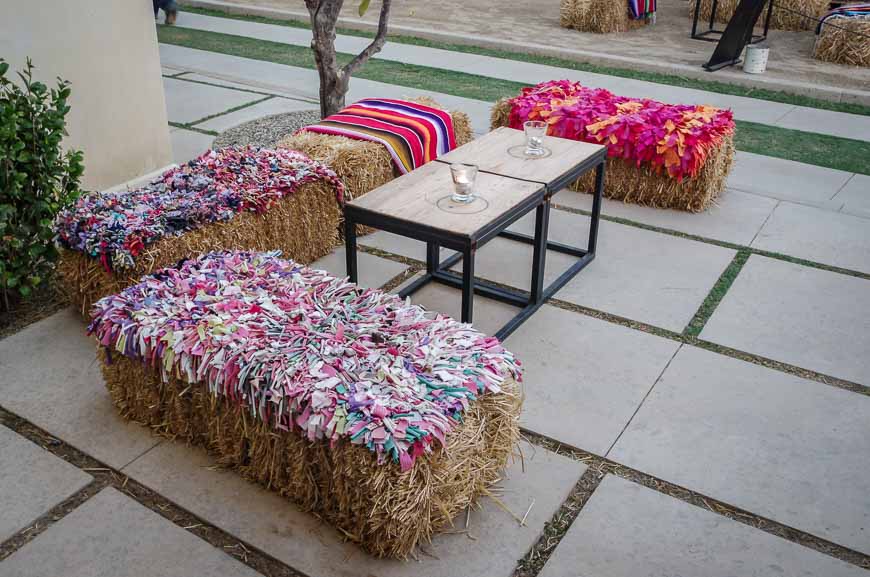 Love these straw bales used as seating at Flora Farms Cabo