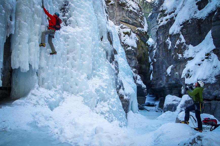 Max demonstrating ice climbing in Alberta