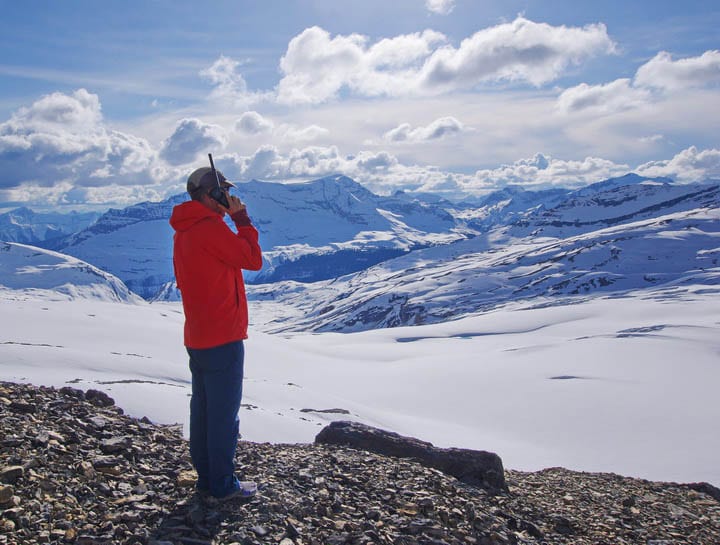 Our guide Shaun getting the weather forecast via SAT phone for the Wapta Traverse