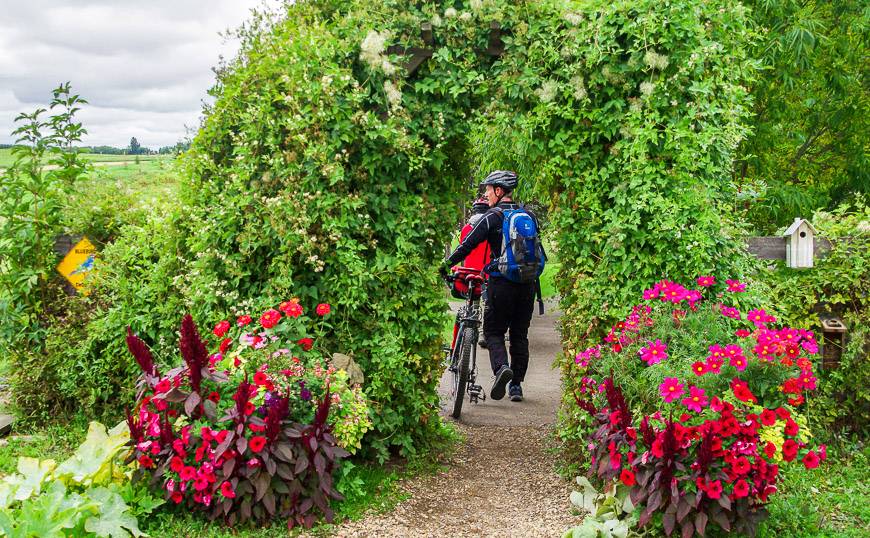 The flower filled entrance to Ellis Bird Farm