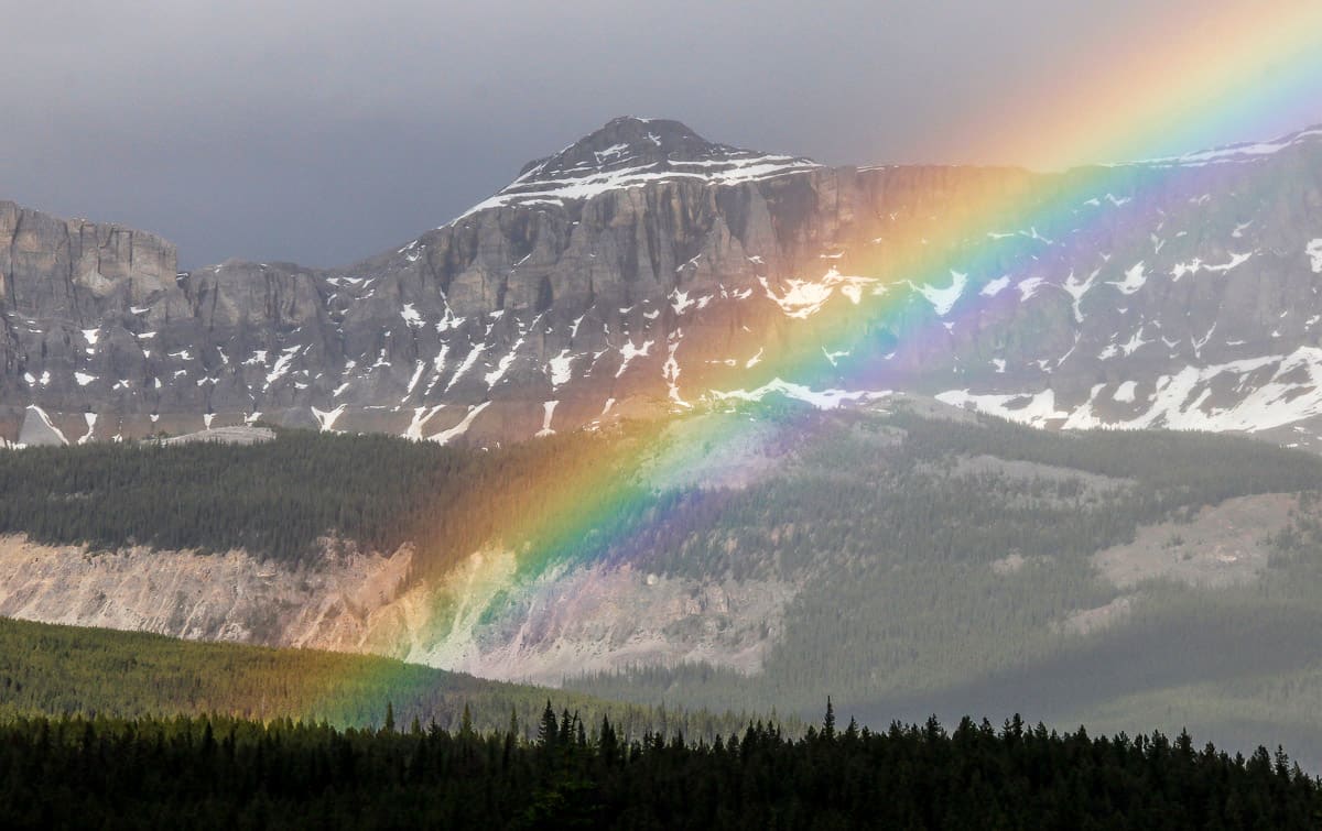 Catching a rainbow near Castle Mountain on the Banff to Jasper drive