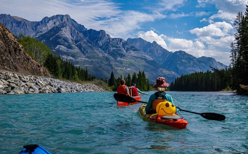 Surrounded by mountains kayaking the Bow River