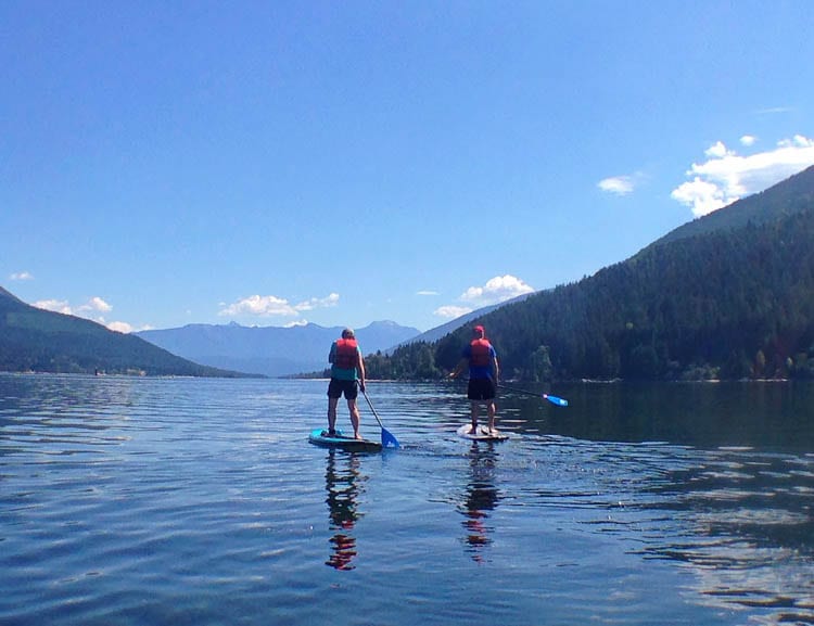 Things to do in Nelson BC include paddleboarding on Kootenay Lake 