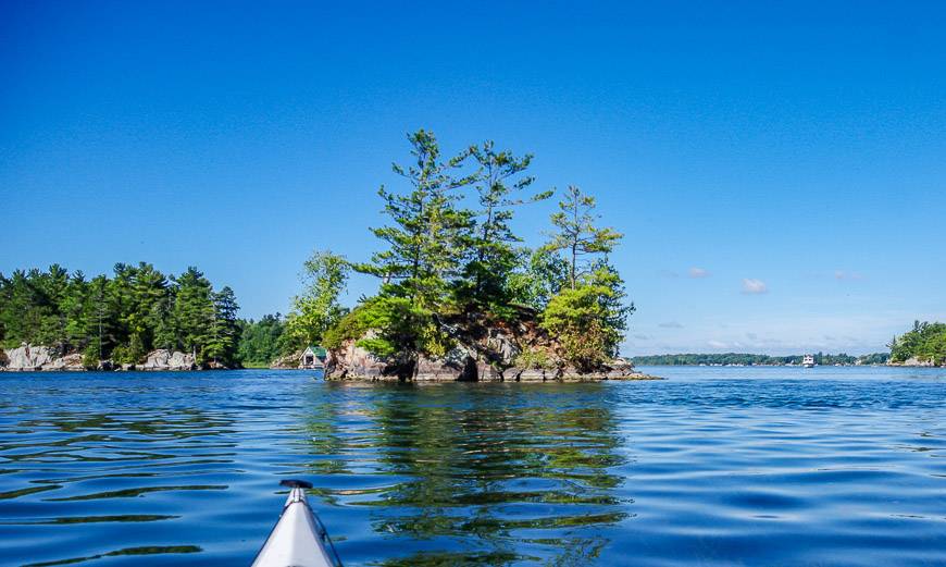 A bluebird day and calm waters at the start of 1000 Islands kayaking on day 2