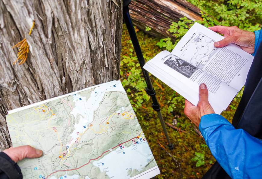Checking out the map against the guidebook - especially early on the backpacking trip