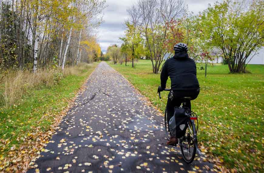 Some of the trail travels behind homes and businesses