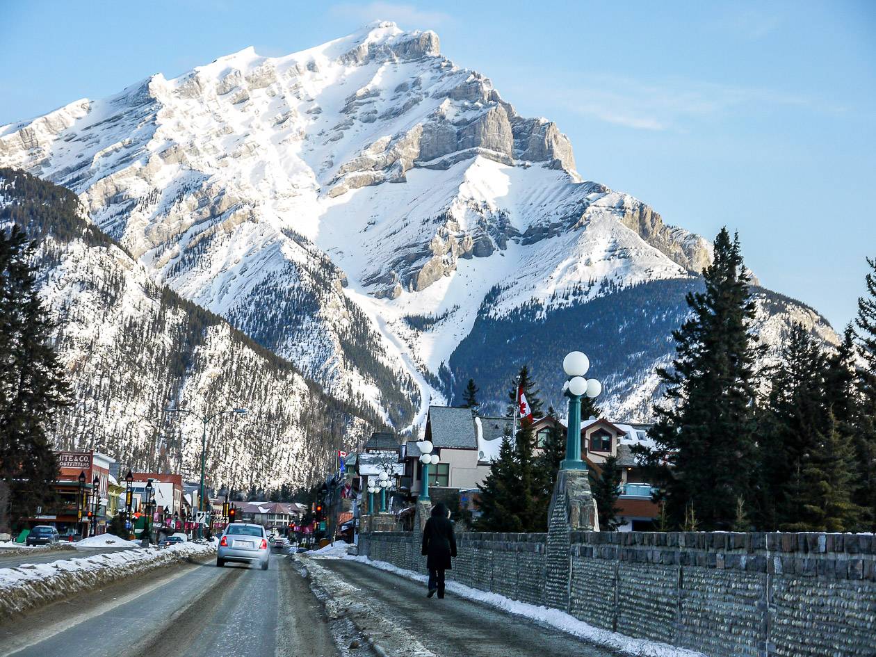 Walking across the Bow River to Banff's Main Street in winter