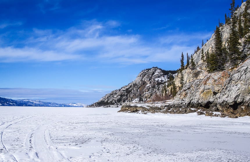 Get up close to spectacular cliffs on the shores of Lake Laberge