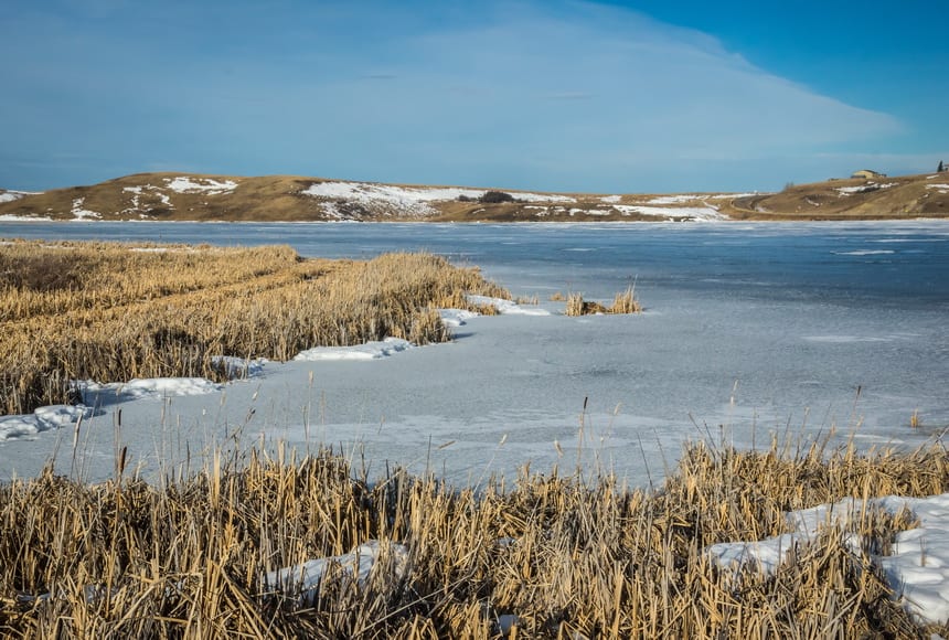 Morning light over Elkwater Lake in Cypress Hills, Alberta width=