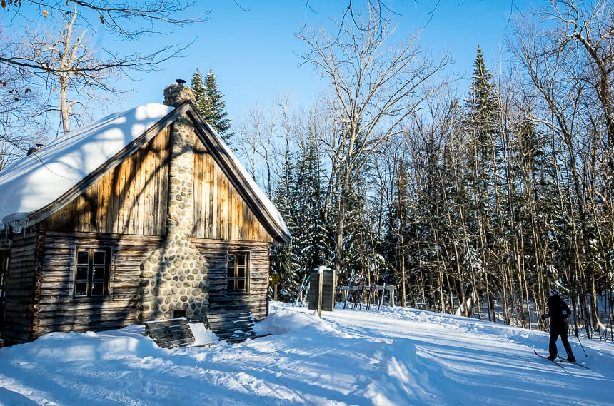  a beautiful warming hut with a woodburning stove