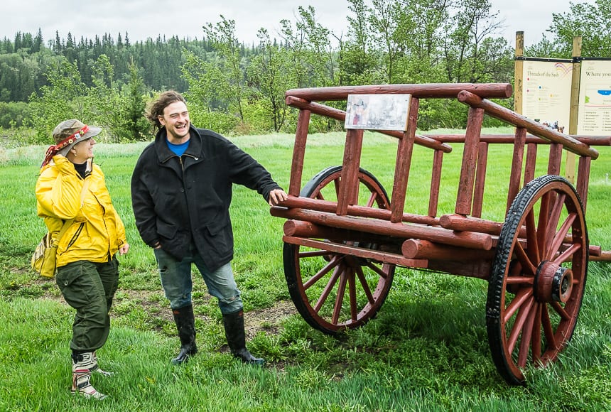 Admiring a Red River cart at a stop in Metis Crossing - a National Historic Site