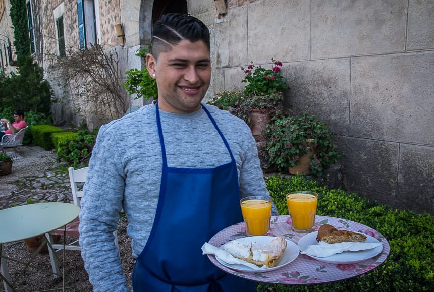 Stopping for fresh squeezed orange juice and a slice of cake at Can Prohom