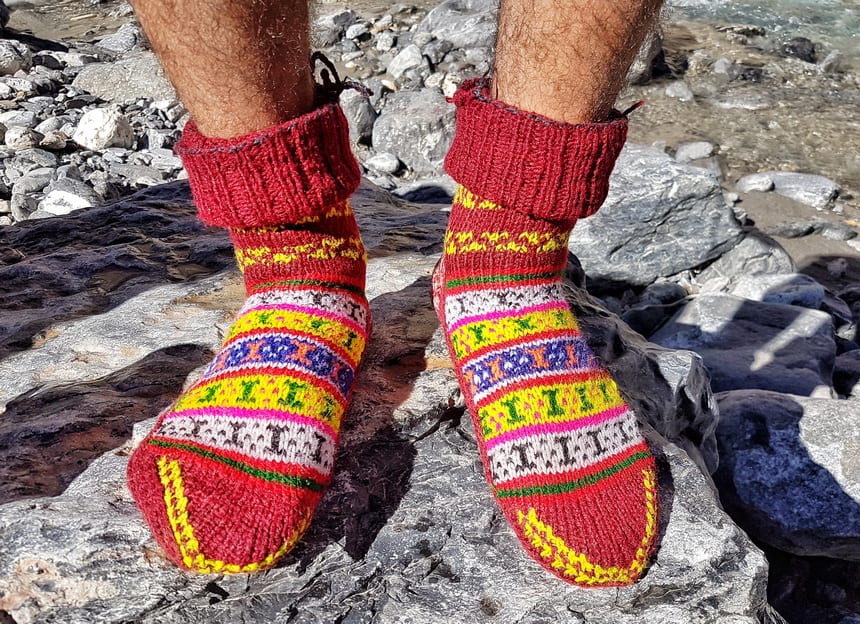 Places to visit in Leh include the markets for warm, colourful socks