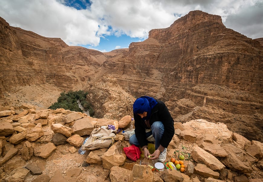  Hassan our guide making lunch with his wife's home baked bread as a base