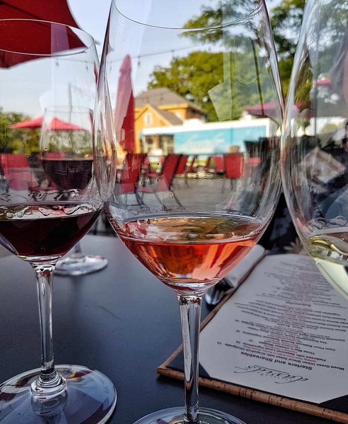 Enjoy a glass of wine and a meal on the patio at Burning Kiln Winery