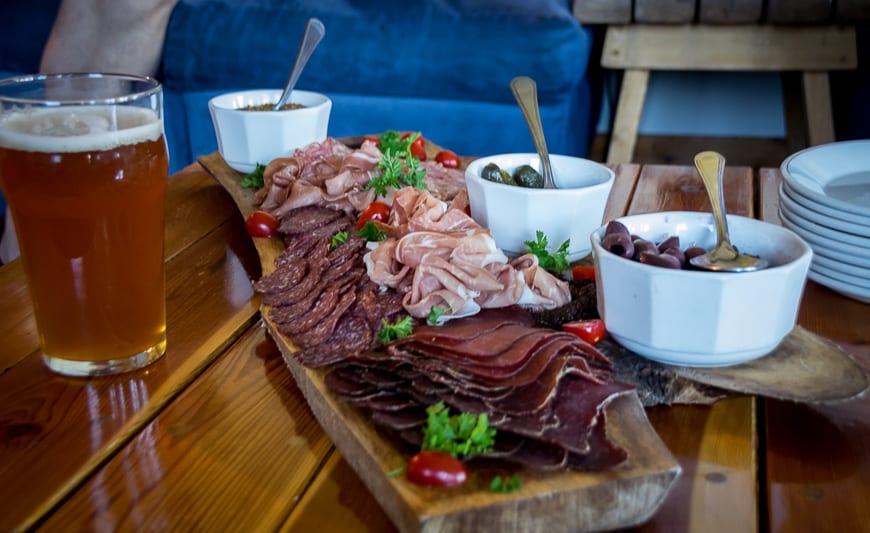  A filled to overflowing charcuterie board served as an appetizer