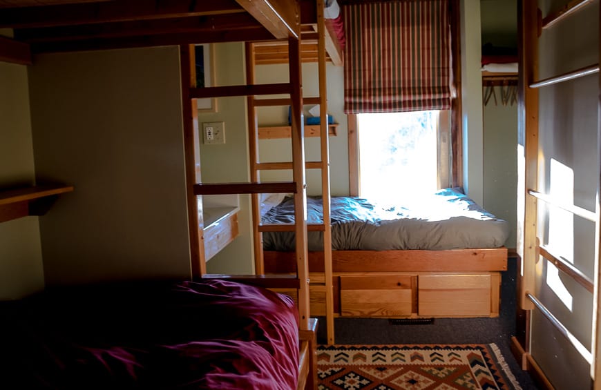 One of the bedrooms with a bunkbed setup at Purcell Mountain Lodge in BC