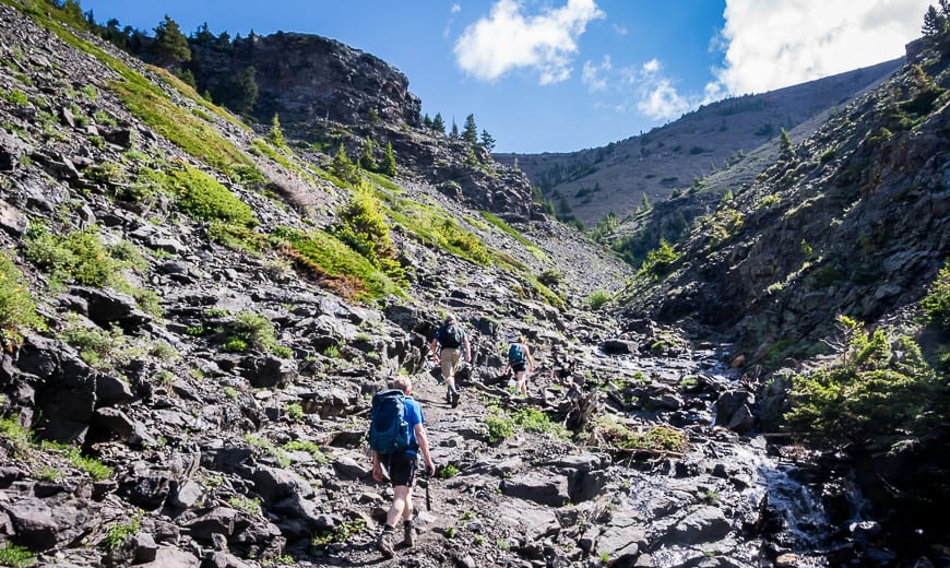 Stay to the left of the creek as you climb up scree and rocky slabs