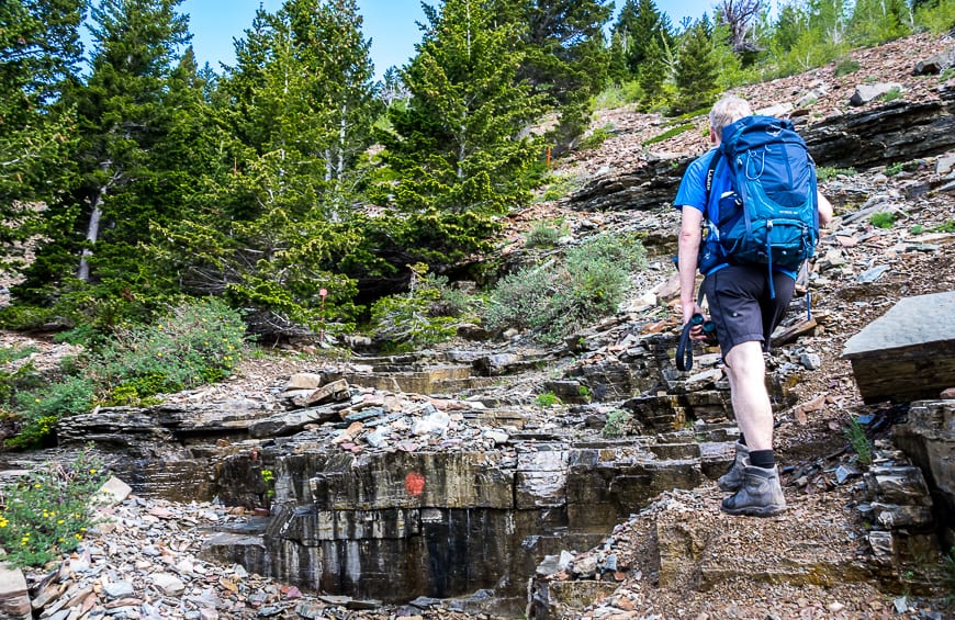 Look for red markings in the rock to stay on the route